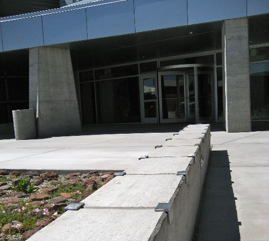 brackets on a low wall